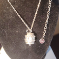 Collana "Luce Primordiale" – Campanella Artigianale Rodio e Baguette Bianche